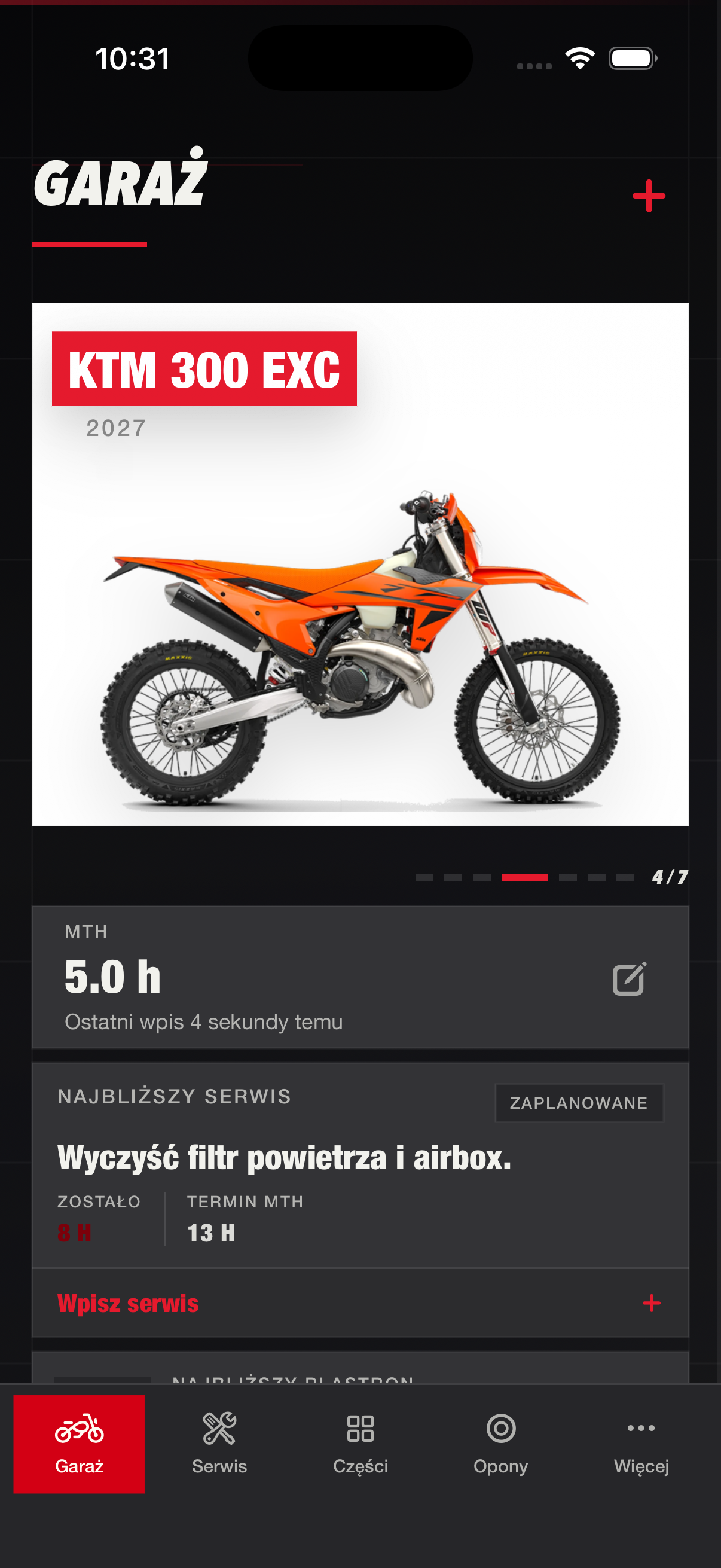 Ekran Garage z motocyklem i statusem serwisu